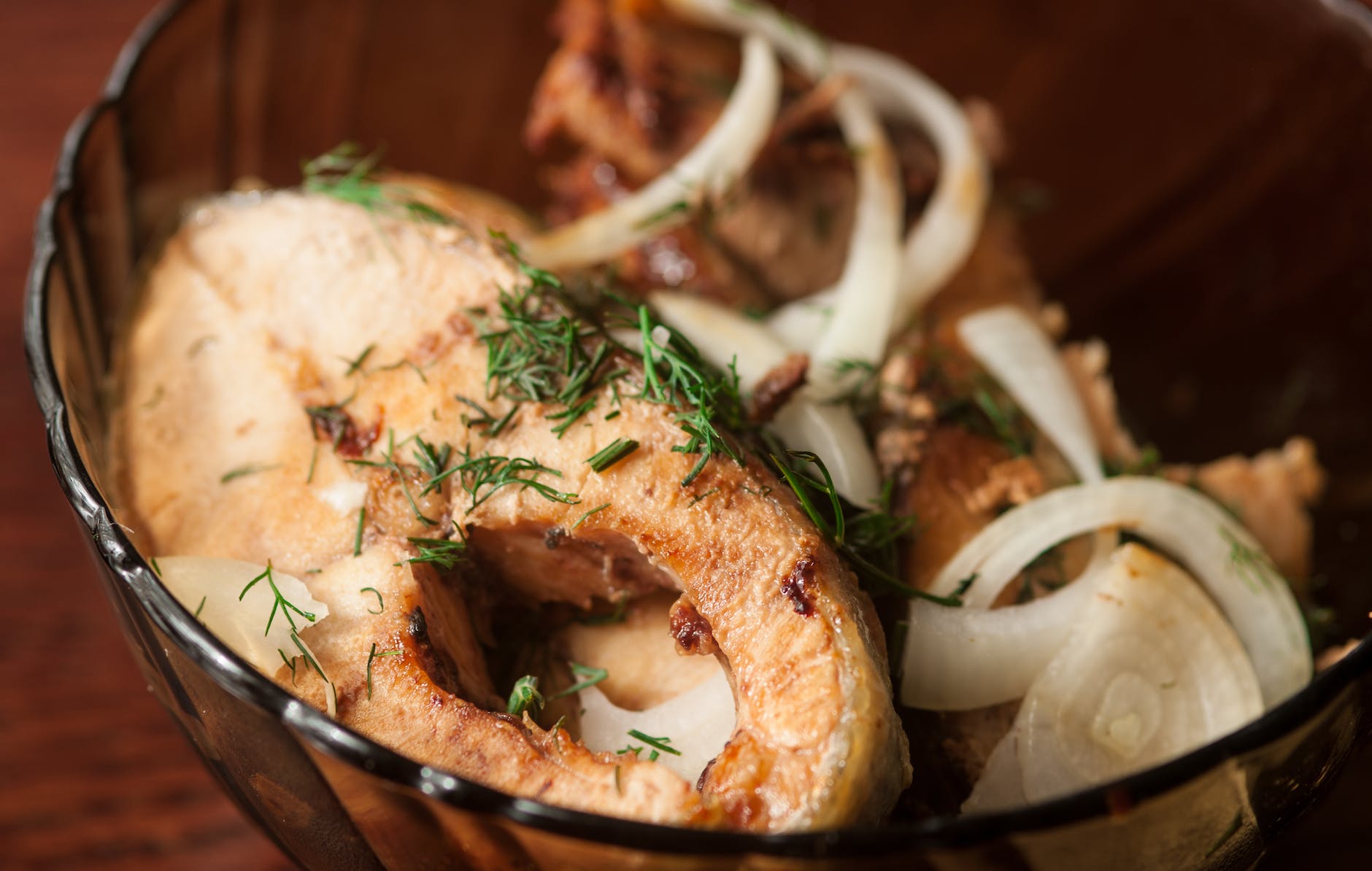 fried fish in close up photography